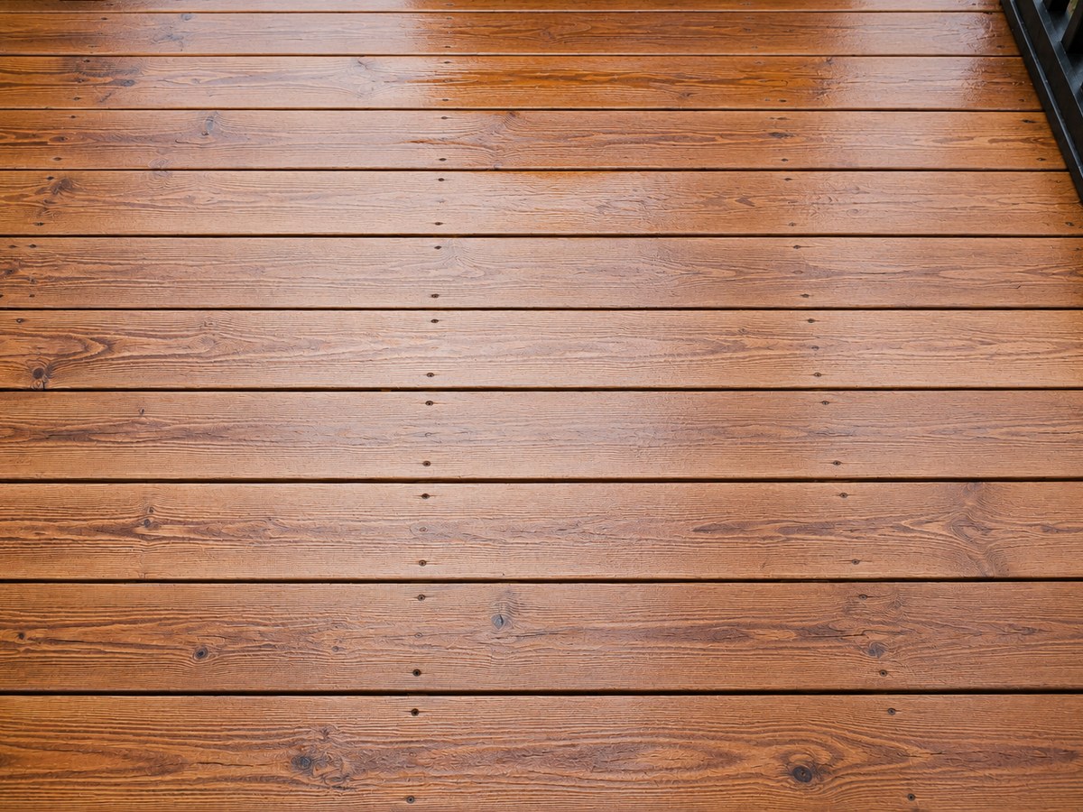 A restored patio and deck after a gentle soft-wash